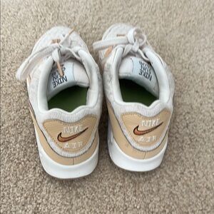 Nike Cream and White Sneakers with Metallic Gold Swoosh